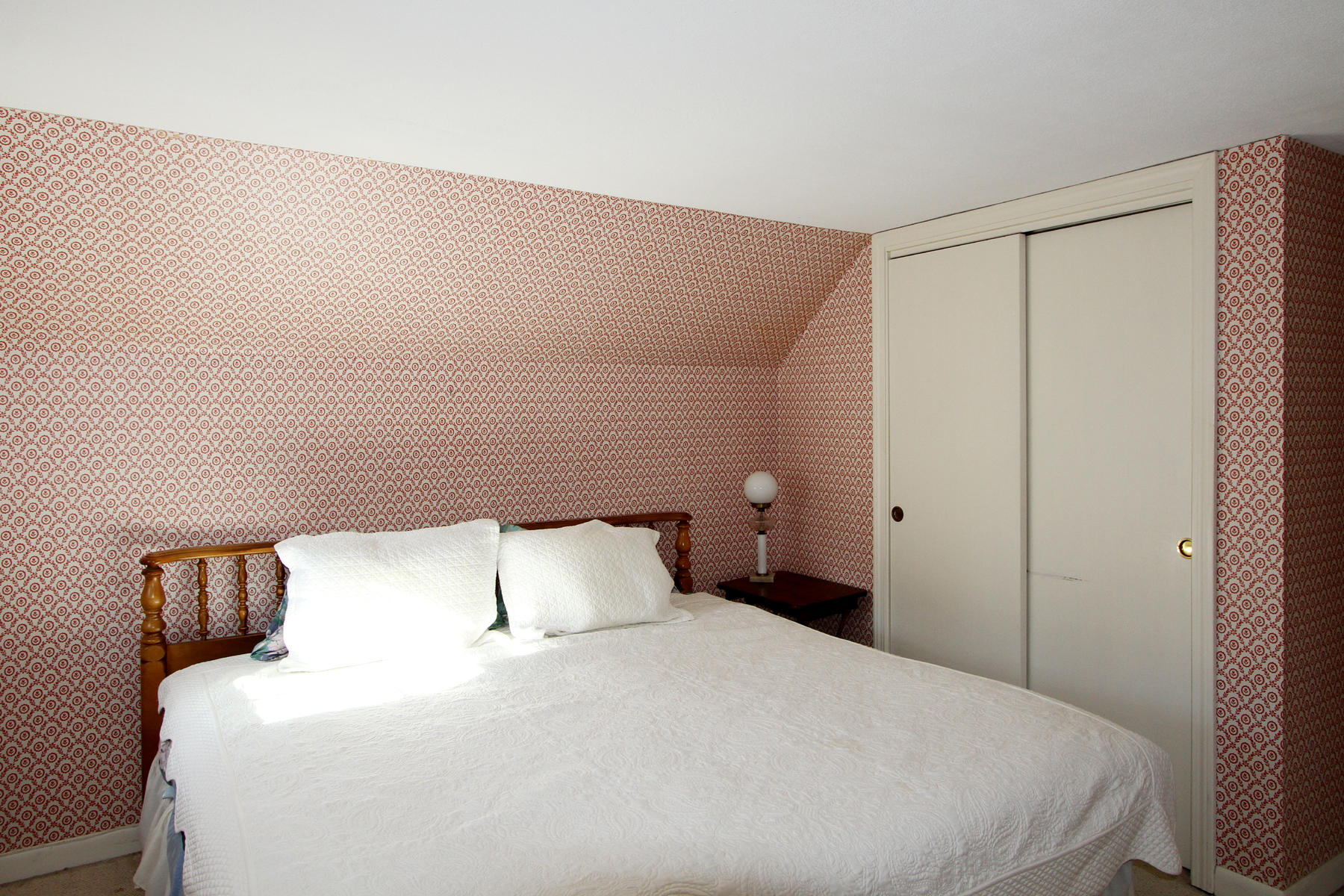 16 Seavers Road Orleans, MA 02653 - Photo 11 of 23 a bedroom with a bed and a night stand