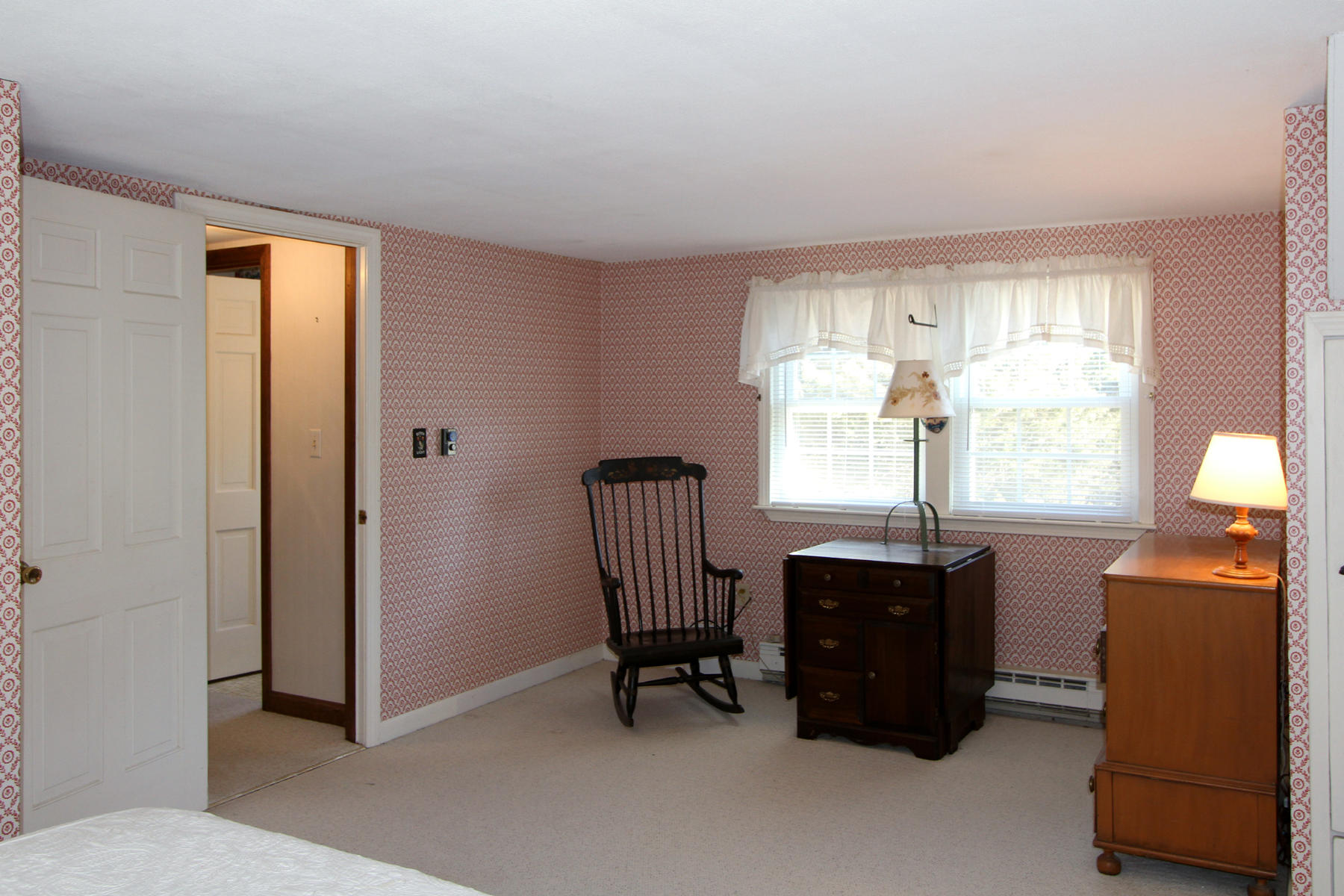 16 Seavers Road Orleans, MA 02653 - Photo 12 of 23 a room with furniture and a window