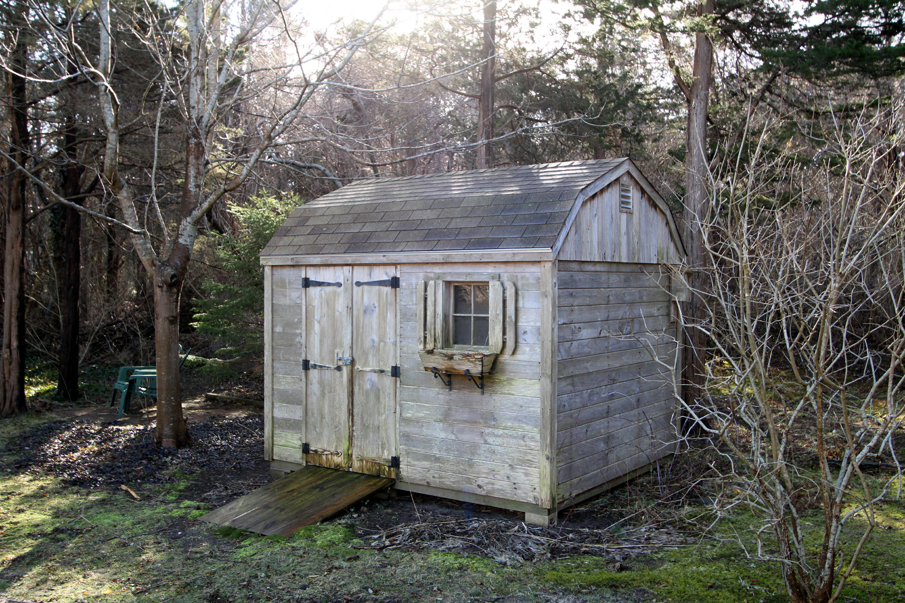 16 Seavers Road Orleans, MA 02653 - Photo 15 of 23 a view of a small house with backyard