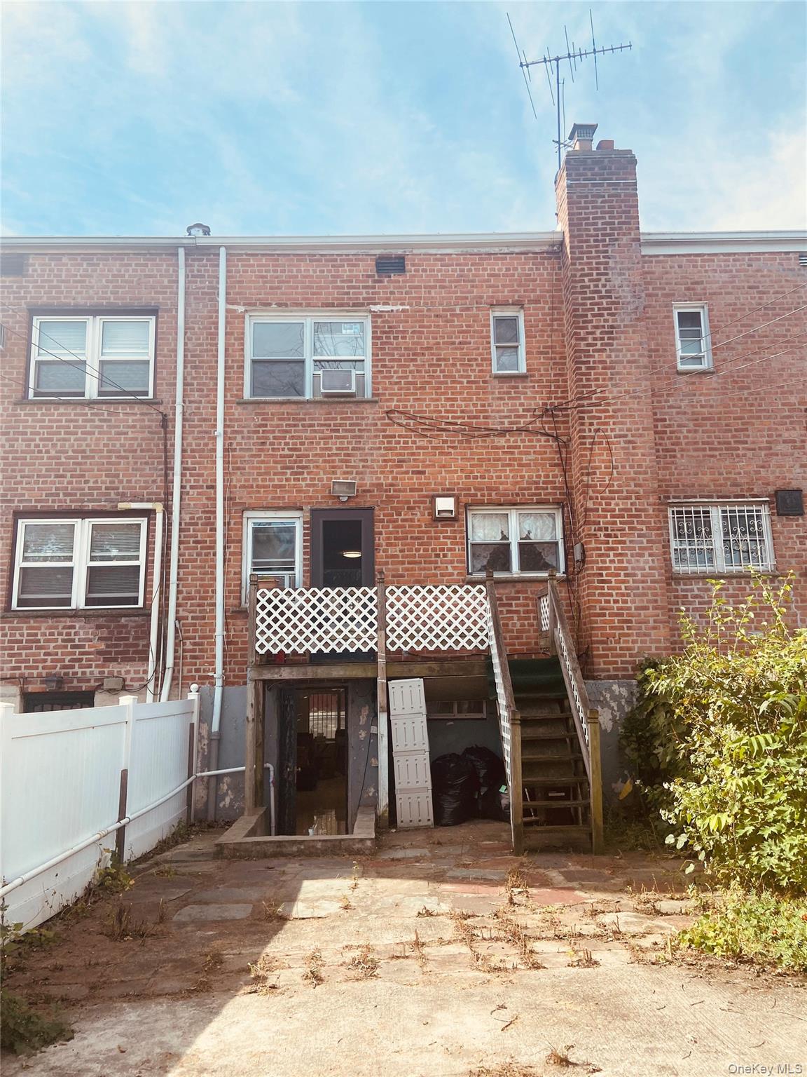 148-03 Horace Harding Expressway Queens, NY 11367 - Photo 18 of 18 a front view of a house with a yard