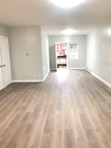 a view of kitchen with wooden floor