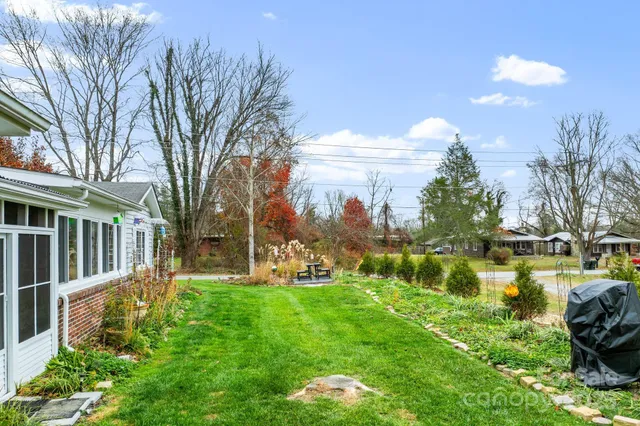 a view of a lake with a house in the background