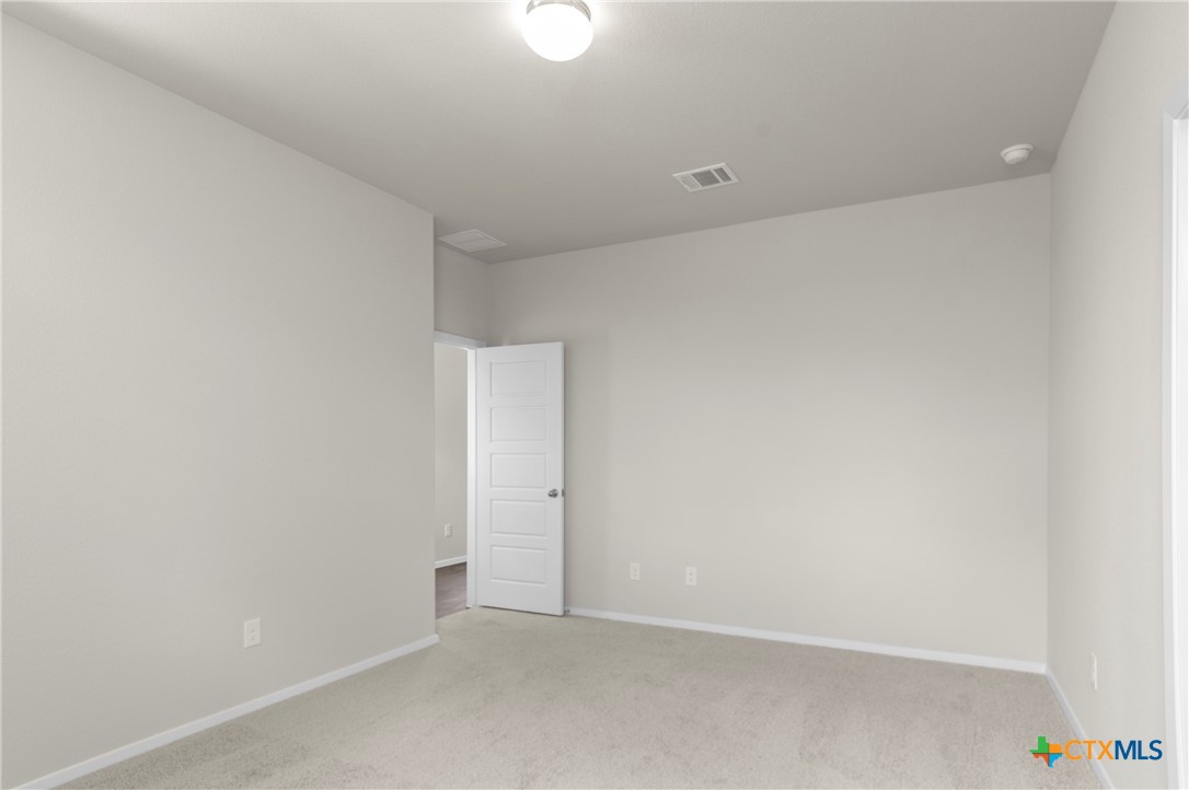 3035 Winding Creek Road Kyle, TX 78640 - Photo 11 of 38 a view of an empty room