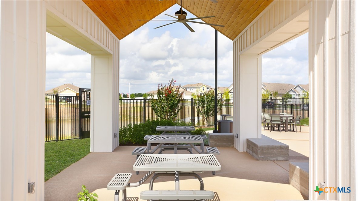 3035 Winding Creek Road Kyle, TX 78640 - Photo 31 of 38 a living room with furniture and a large window