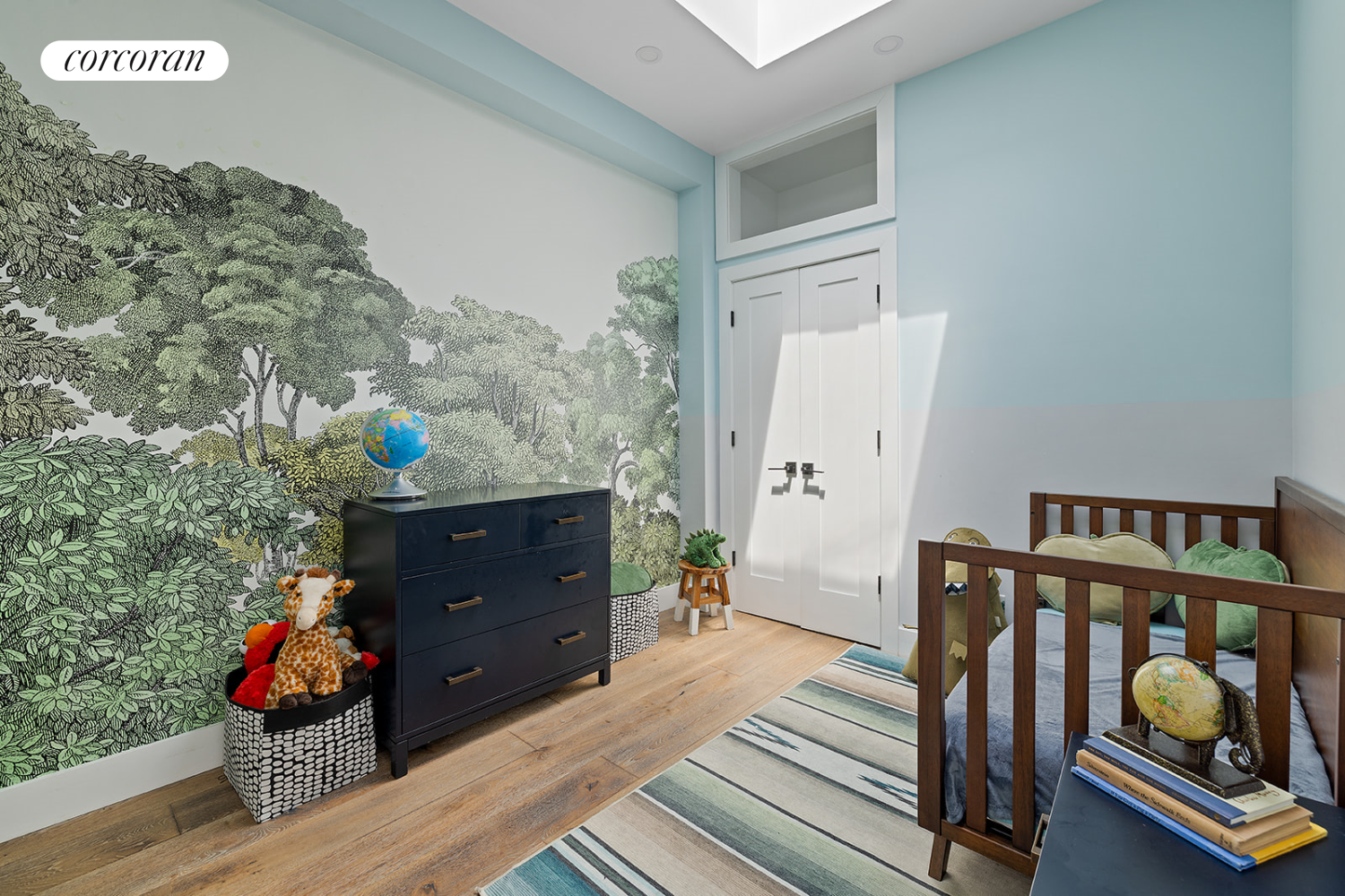 416 Halsey Street Brooklyn, NY 11233 - Photo 10 of 17 a bedroom with furniture and a wooden floor