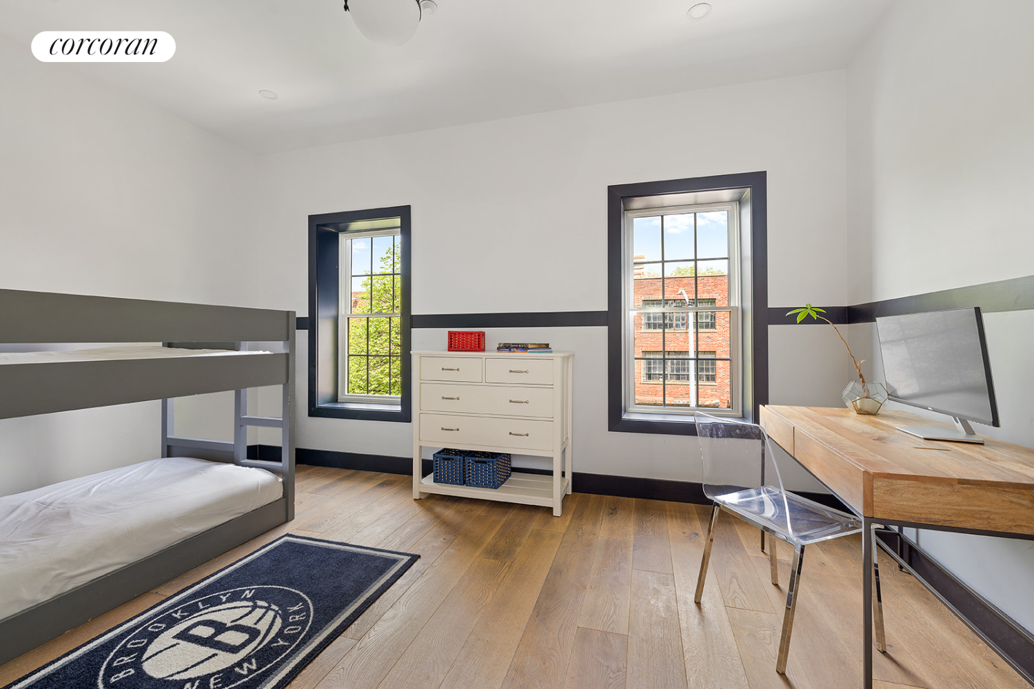 416 Halsey Street Brooklyn, NY 11233 - Photo 11 of 17 a bedroom with a bed and a window