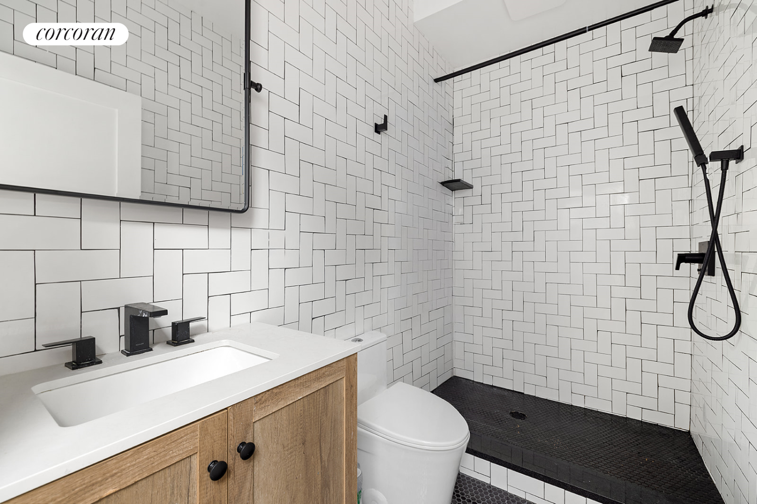 416 Halsey Street Brooklyn, NY 11233 - Photo 12 of 17 a bathroom with a sink a toilet and shower