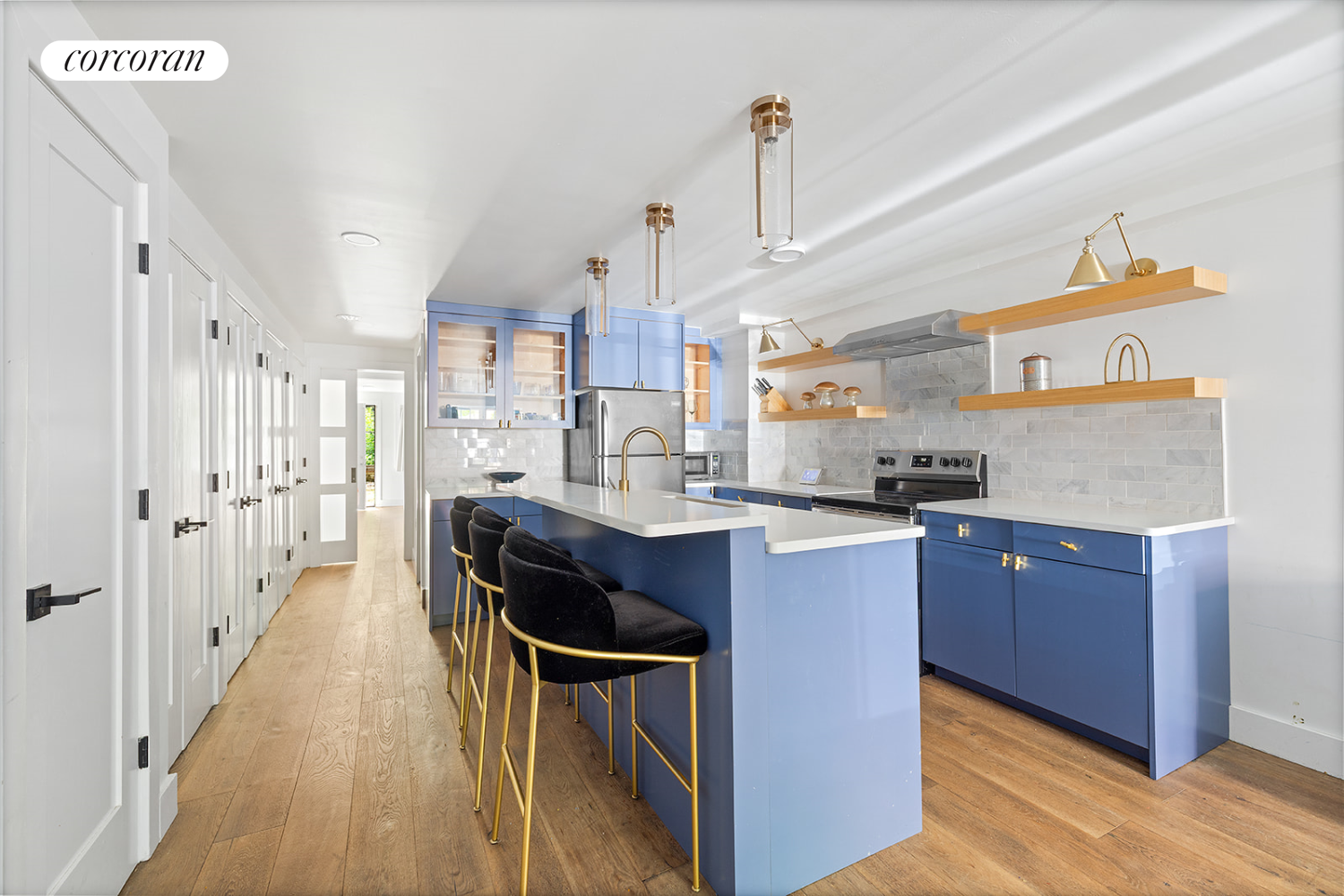 416 Halsey Street Brooklyn, NY 11233 - Photo 14 of 17 a kitchen with stainless steel appliances granite countertop a sink a stove and a wooden floors