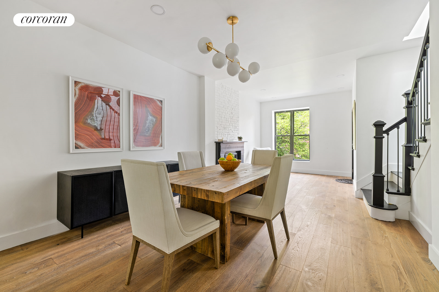 416 Halsey Street Brooklyn, NY 11233 - Photo 2 of 17 a view of a dining room with furniture window and wooden floor