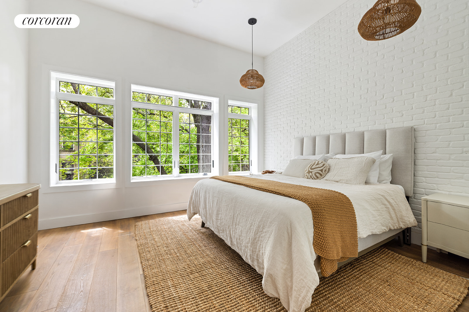 416 Halsey Street Brooklyn, NY 11233 - Photo 7 of 17 a bedroom with a large bed and a large window