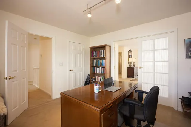 a view of a livingroom with furniture and window