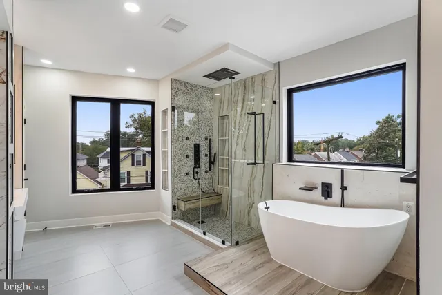 a bathroom with a sink a mirror and a toilet