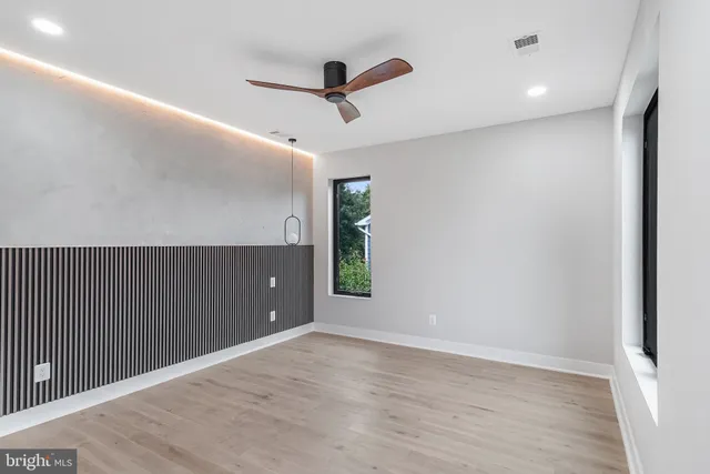 a bedroom with a bed and a walk in closet