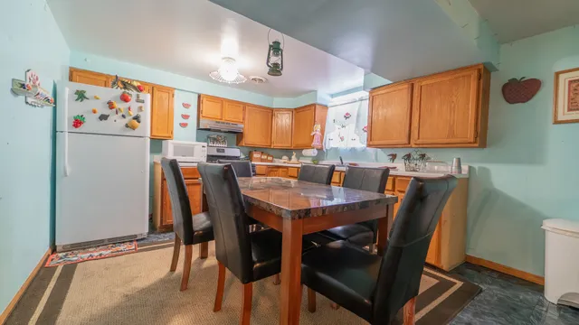 a view of a dining room with furniture