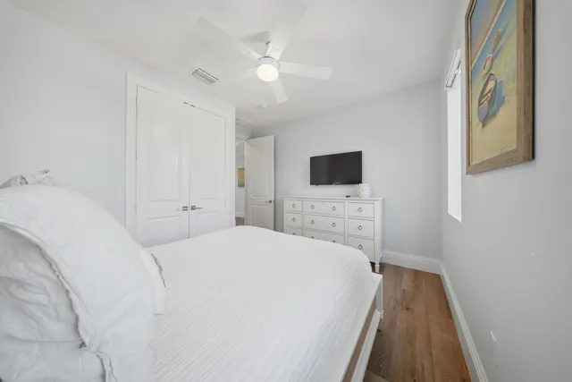 a view of a chairs and table in the balcony