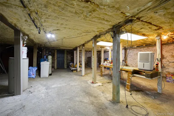 a view of house with outdoor space and a street