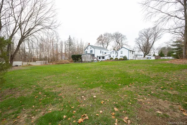 a front view of a house with garden and porch
