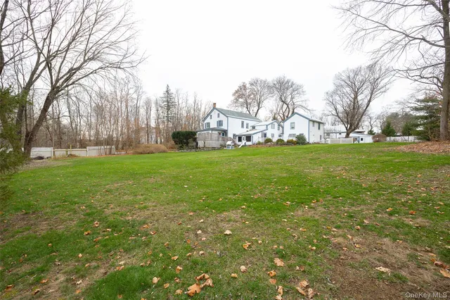 a front view of a house with garden and porch