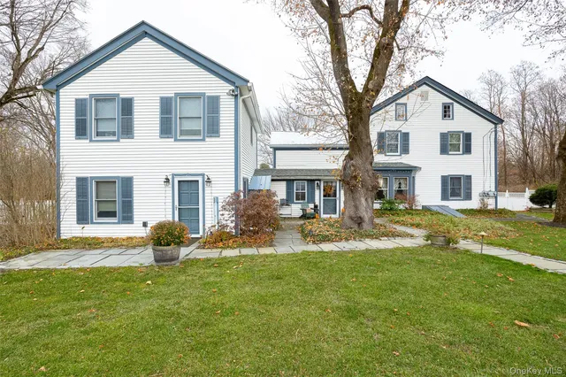 a view of a patio with a yard