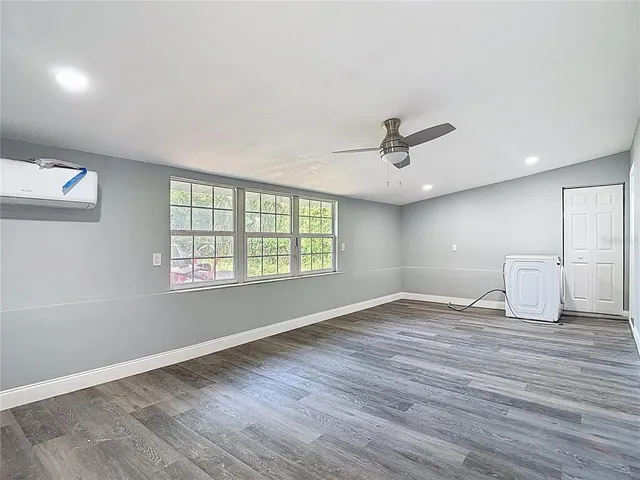 a house view with a backyard space