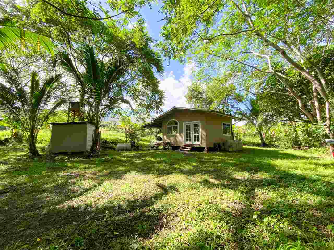 125 Uwala Road Hana, HI 96713 - Photo 3 of 29 a view of a house with a yard