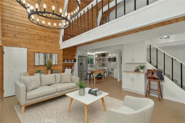 a living room with furniture and a table