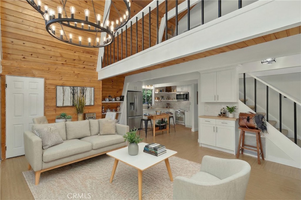 a living room with furniture and a table