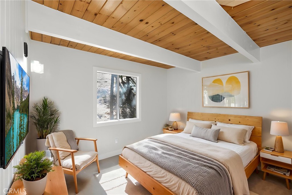 26980 Everest Road Lake Arrowhead, CA 92391 - Photo 21 of 49 1st floor bedroom virtually staged.