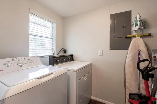 a utility room with dryer and washer