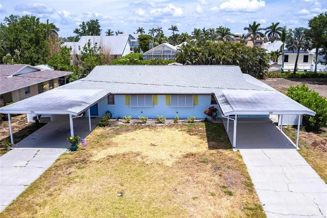a view of a house with a swimming pool