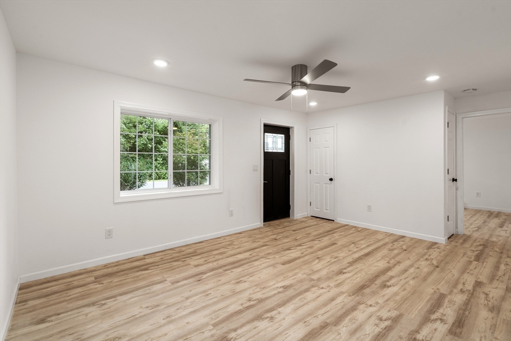 87 Vincent Street Springfield, MA 01129 - Photo 2 of 32 a view of an empty room with a window