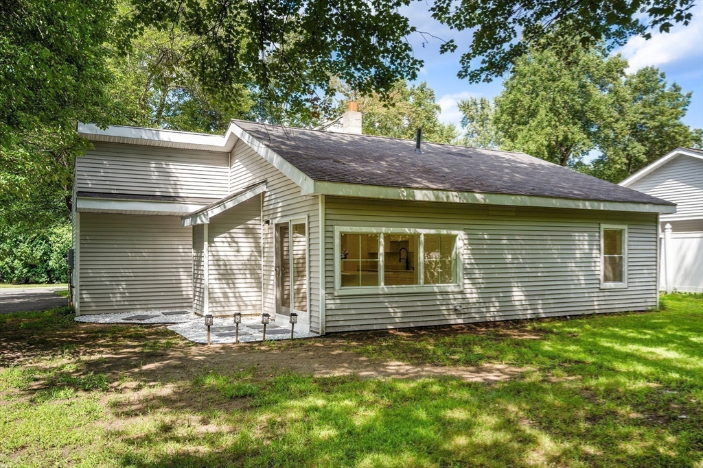 87 Vincent Street Springfield, MA 01129 - Photo 22 of 32 a front view of a house with garden