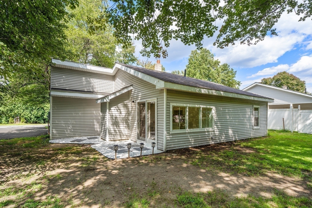 87 Vincent Street Springfield, MA 01129 - Photo 23 of 32 front view of a house with a yard