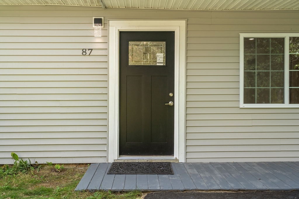87 Vincent Street Springfield, MA 01129 - Photo 29 of 32 a view of a door of a house with a window