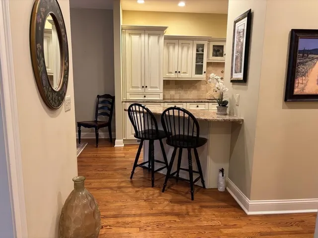 a view of a hallway with washer and dryer