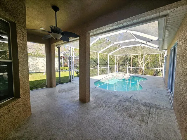 a view of a room with porch and patio