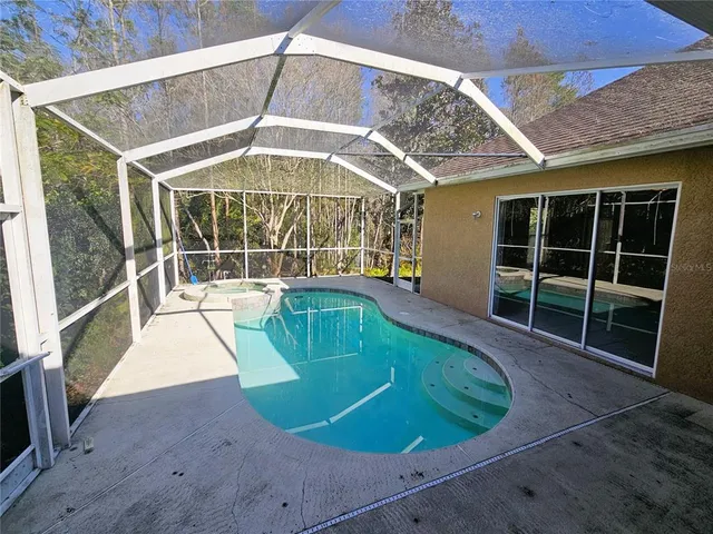 a view of a backyard of a house