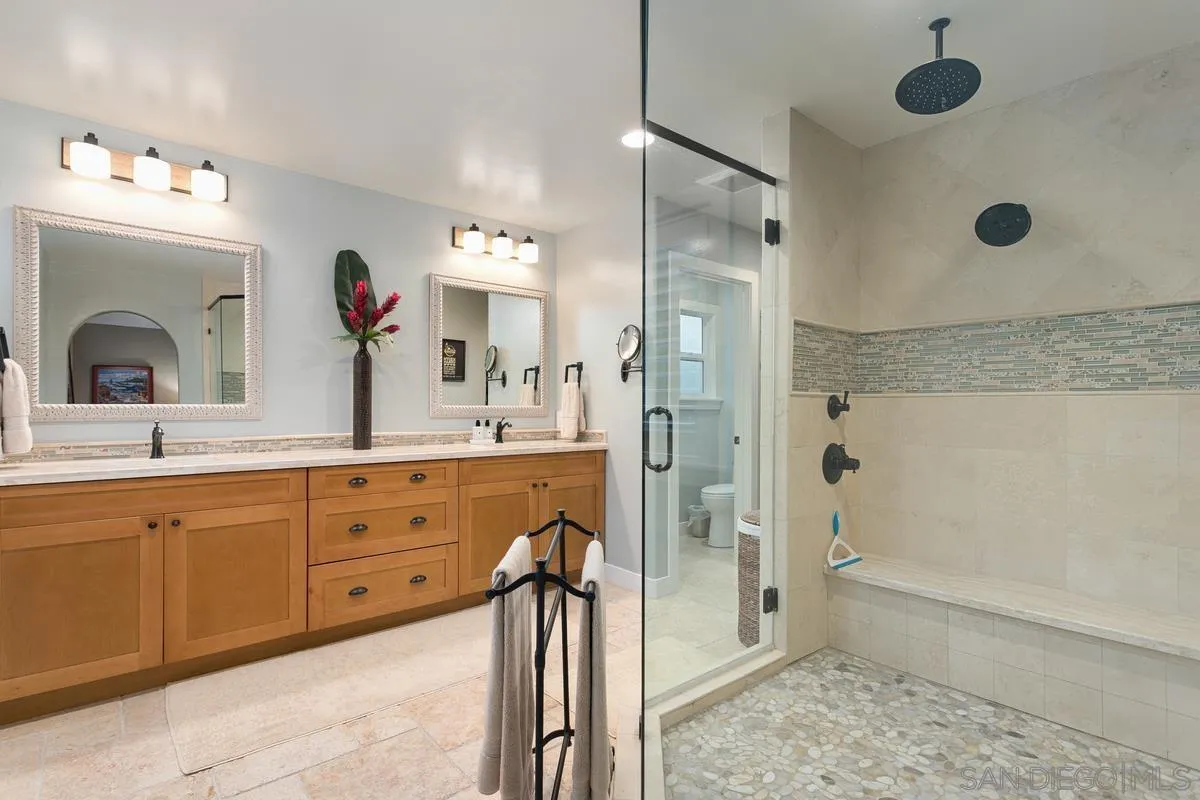 3526 Avenida Sierra Escondido, CA 92029 - Photo 18 of 36 a spacious bathroom with a granite countertop sink mirror and shower