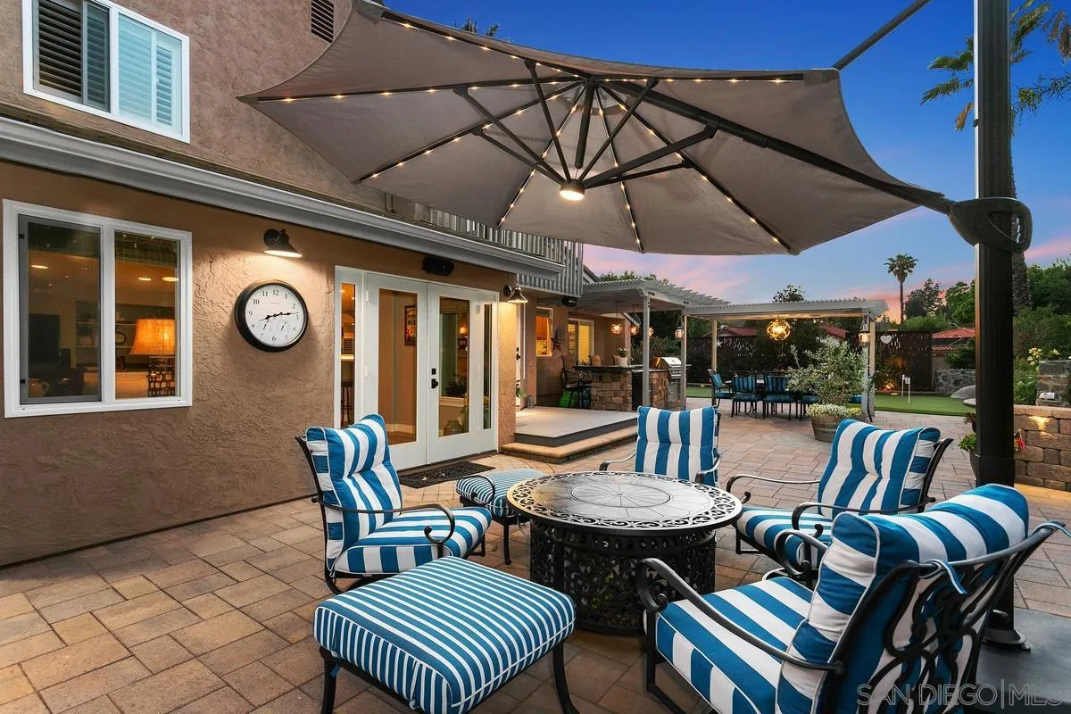 3526 Avenida Sierra Escondido, CA 92029 - Photo 26 of 36 a view of a patio with a table and chairs