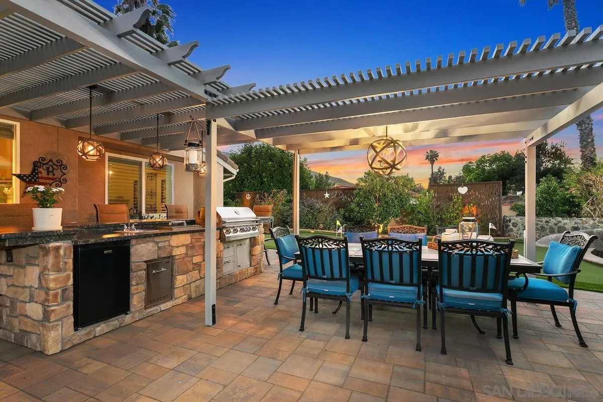3526 Avenida Sierra Escondido, CA 92029 - Photo 27 of 36 a view of a patio with table and chairs