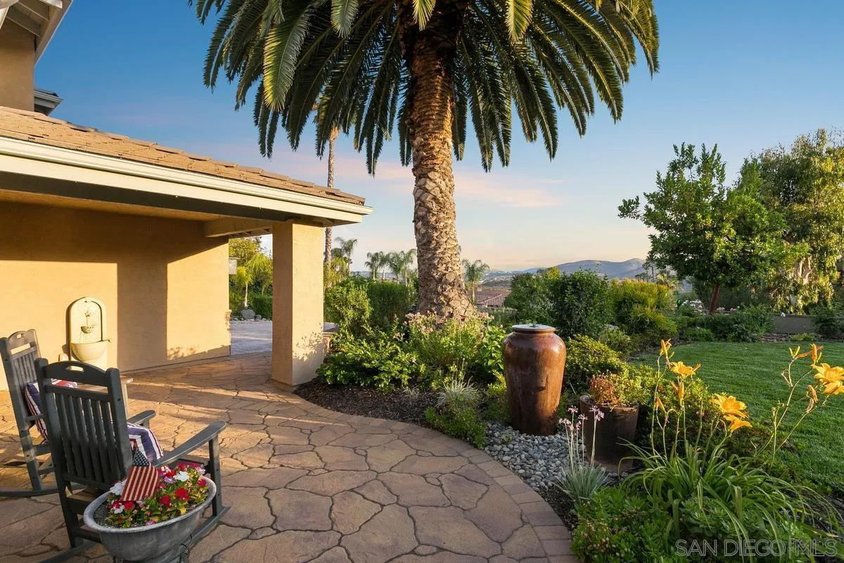 3526 Avenida Sierra Escondido, CA 92029 - Photo 3 of 36 a backyard of a house with lots of green space and plants