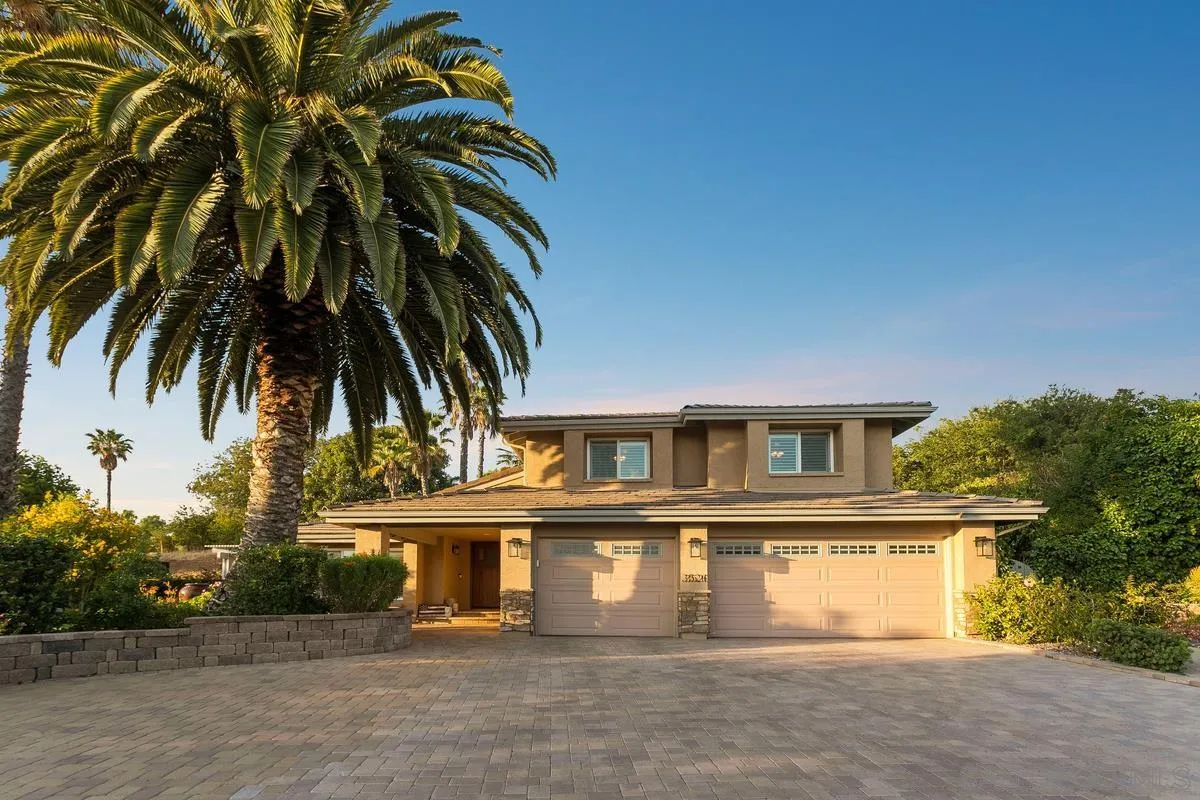 3526 Avenida Sierra Escondido, CA 92029 - Photo 34 of 36 a front view of a house with a yard