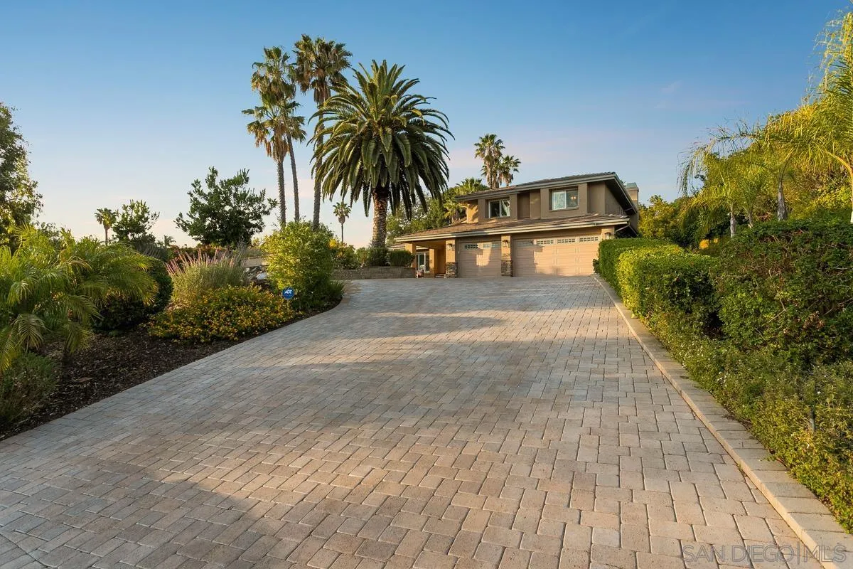 3526 Avenida Sierra Escondido, CA 92029 - Photo 35 of 36 a view of a house with a yard and potted plants