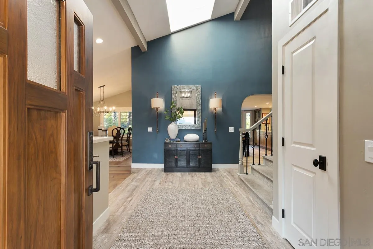 3526 Avenida Sierra Escondido, CA 92029 - Photo 4 of 36 a view of a hallway with a livingroom and furniture