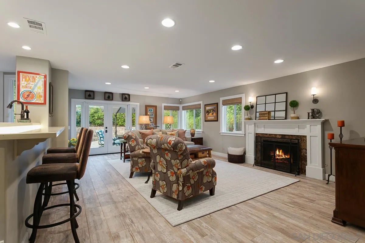 3526 Avenida Sierra Escondido, CA 92029 - Photo 10 of 36 a living room with furniture and a fireplace
