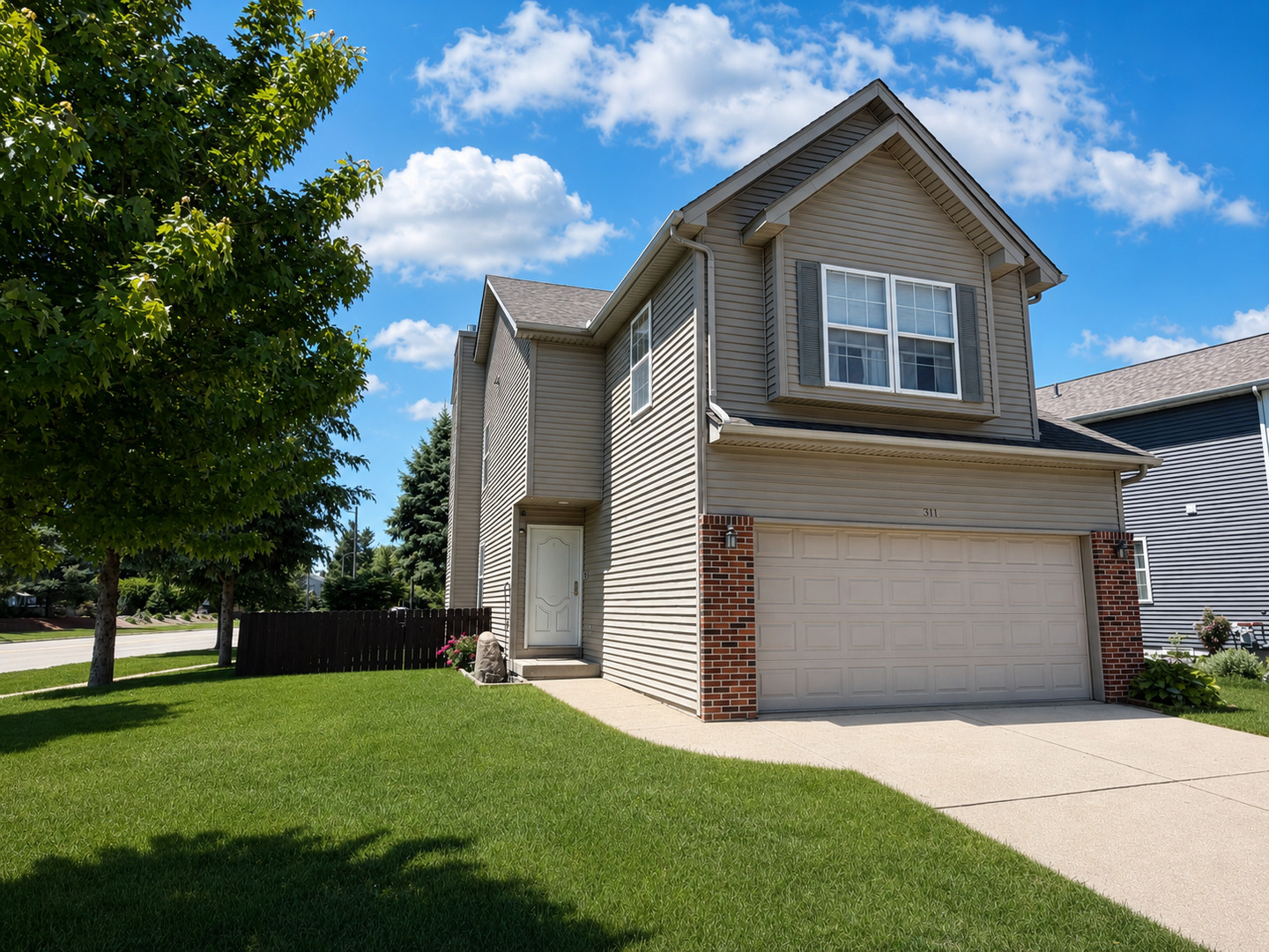 311 Old Farm Road Bloomington, IL 61704 - Photo 1 of 34 a front view of house with a yard