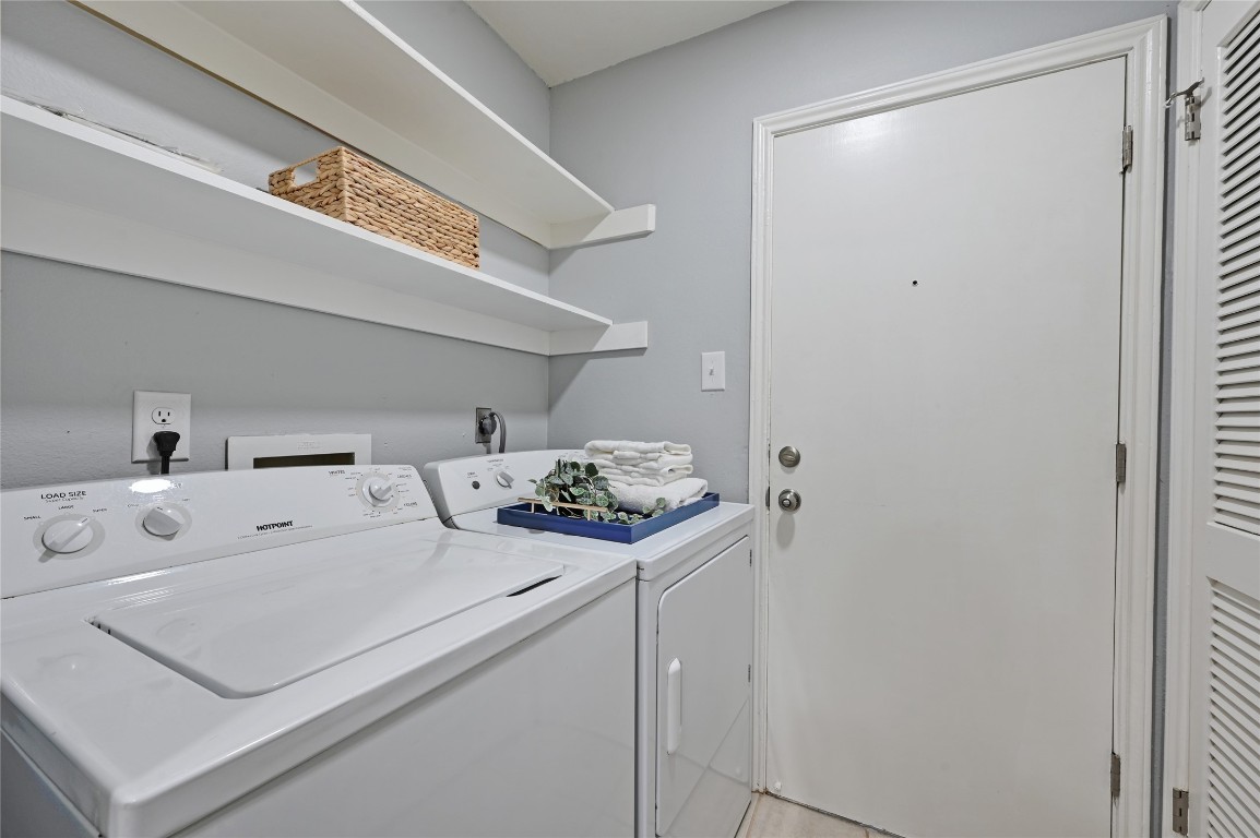 512 Eberhart Lane, Unit 303 Austin, TX 78745 - Photo 11 of 12 a utility room with dryer and washer