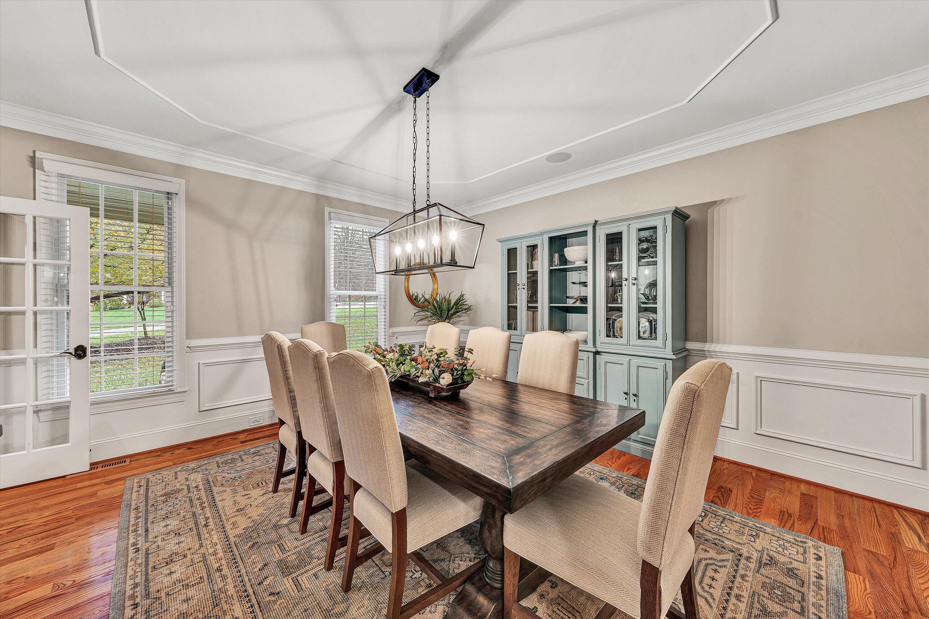 5431 Ridgelea Estates Drive Roanoke, VA 24018 - Photo 13 of 71 a view of a dining room with furniture wooden floor and chandelier