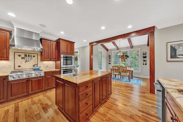a view of a patio with a table and chairs