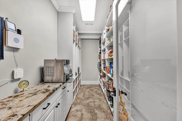 a bedroom with furniture window and wooden floor